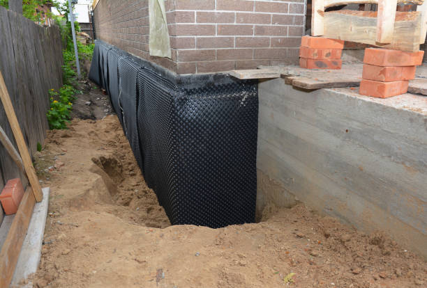 SJ Waterproofing Pros technician performing targeted Exterior Waterproofing assessment in Williamsport, PA